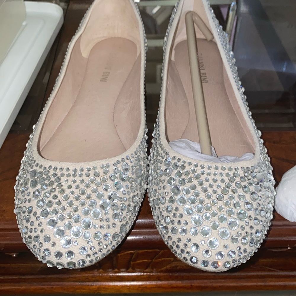 Never used and new in box, pair of Gianni Bini ladies flats in a size 7.